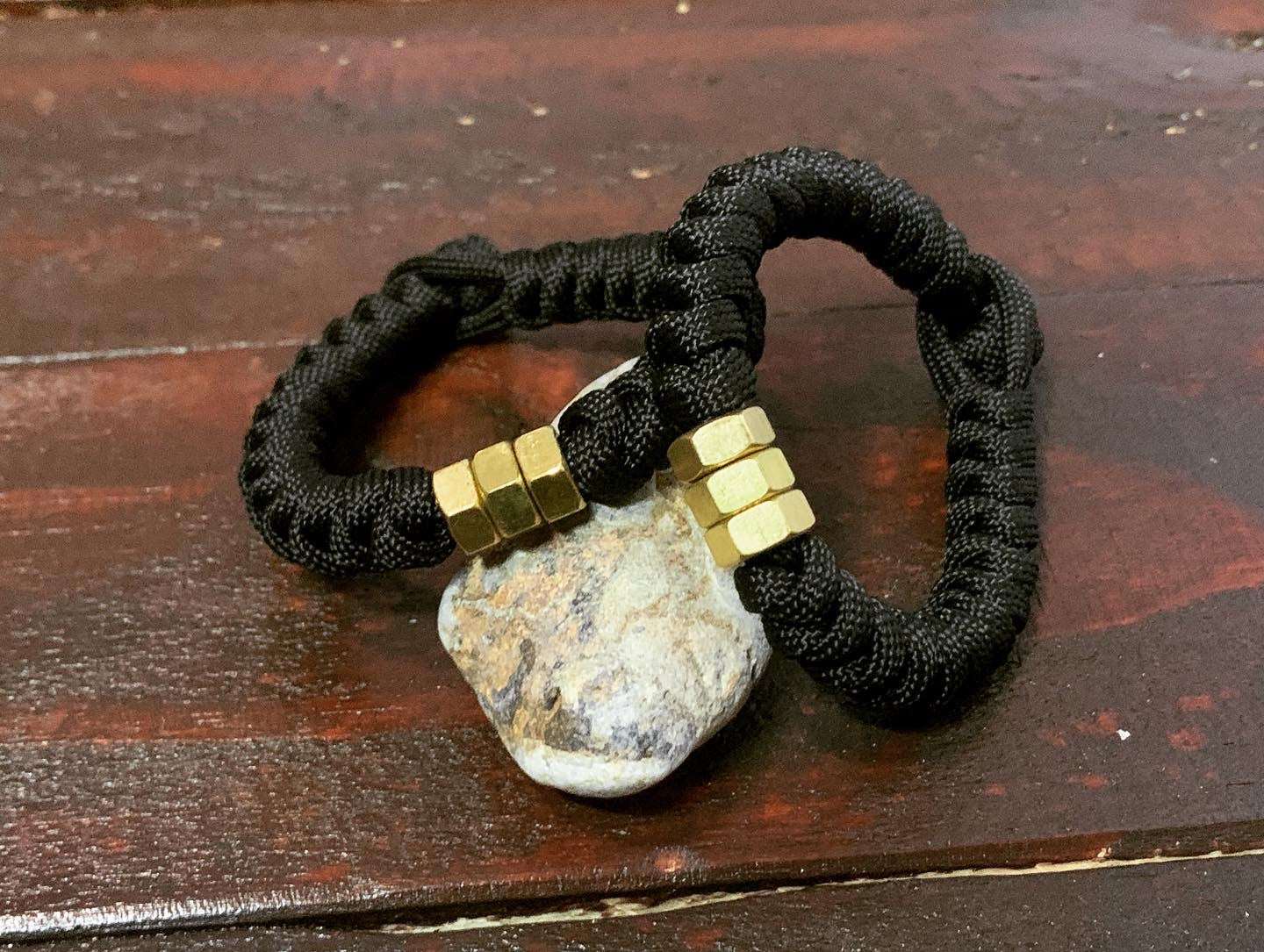 Snake knot paracord bracelets with brass hex nuts